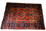 Vintage Engelas rug, madder red field, loosely drawn Herati pattern, dark blue border.