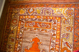 Orange mihrab, striated silver-gray field, with unique mauve and yellow border patterns.