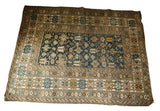 Antique Caucasian rug with unusual teal blue abrashed field and complex geometric borders.