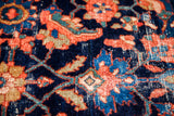 Worn deep indigo abrash, with coral and light blue whimsical patterns on antique Lilihan.