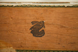 Antique Cuban cigar box: detailed wood patina, black graphic stamp, and green patterned border.