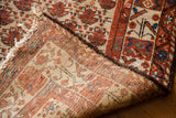 Hand-knotted foundation, fringe, and distressed ivory pile of an antique Hamadan rug.