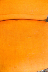 Vintage Pirelli by Castelli DSC chair's orange fabric showing minor tear and surface wear.