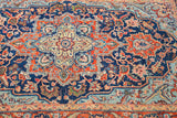 Saturated blue field with prominent mint green medallion and rust floral motifs.