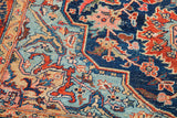 Unusual saturated blue and mint green Heriz rug design with coral and tan elements.
