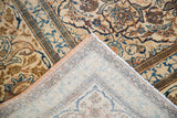 Worn vintage Tabriz pile in silver, ivory, rust, blue, with hand-knotted foundation.