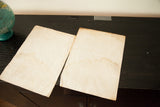 Two blank 18th century Porism engraving plates showing aged paper and discoloration.