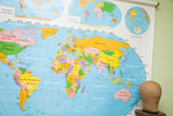 Upper right detail of the Nystrom World map showing the South Polar View globe.