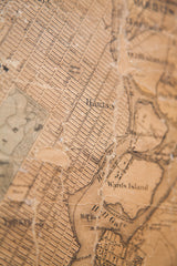 Sepia-toned antique New York City map detail of Harlem, Wards Island, Hell Gate.