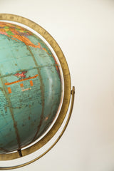 Replogle globe map detail with North America, blue Pacific Ocean, and legend.