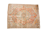 Antique Silk Tabriz mat with soft peach medallion and delicate floral motifs.