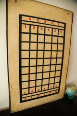 Hand-painted red 'FINISH' text and numbered grid on the vintage wooden game board.