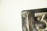 Distressed black and silver Art Deco number '3' with an aged bolt hole.