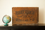 Vintage Art Deco Frederick Stearns apothecary wooden crate with black lettering and dovetail joints.