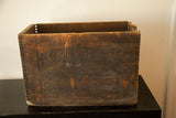 Aged wooden side of the Frederick Stearns apothecary crate with faded lettering and dovetail joints.