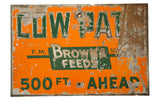 Antique Cow Path Brown's Feeds metal sign, orange and green, with chippy, rusty patina, 12x18 inches.