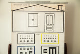 Yellow bordered Snellen's test symbols on a vintage Massachusetts vision chart.