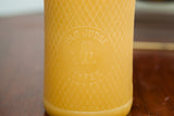 Embossed Old Judge owl and Coffee text on vintage glass harlequin pattern candle jar.