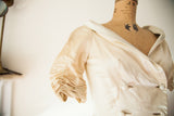 Detail of the ruched sleeve and wide collar on the vintage Lucie Ann silk satin gown.