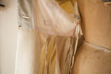Interior view of the Lucie Ann gown showing its silk lining and original designer label.