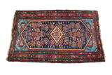Vintage Blue Hamadan rug featuring jewel tones and vivid aqua spandrels.