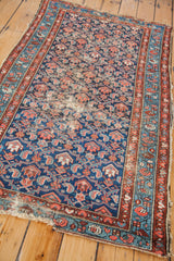 Vintage blue Hamadan runner with textural wear and muted herati patterns.