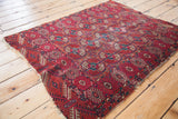 Decorative antique Tekke rug showcasing richly textured madder red and blue geometric guls.