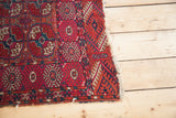 Textural pile of antique Tekke rug, with madder red and blue octagonal gul motifs.