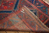 Reverse view of antique tribal Kurdish wool rug, highlighting its hand-knotted foundation.
