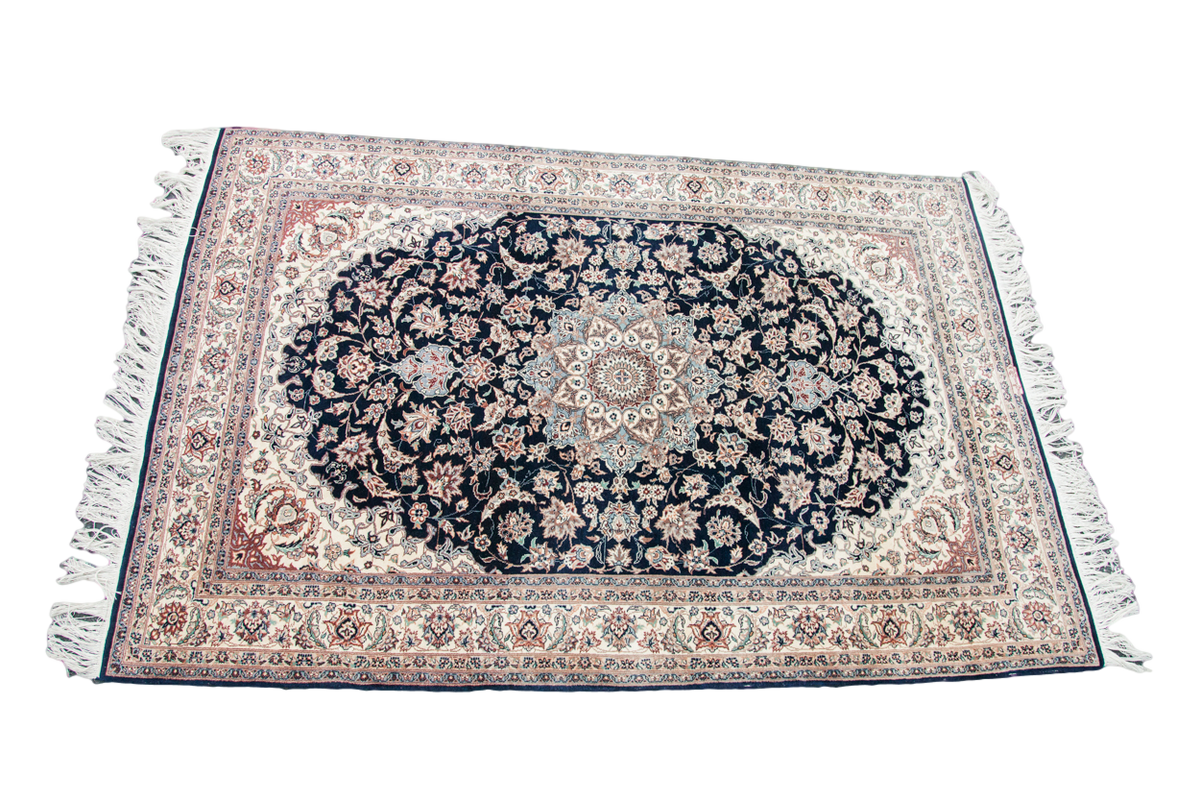 Vintage Pak Persian rug with a traditional medallion, dark navy floral field, soft ivory border, 4'7" x 6'11".