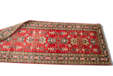 Vintage Red Pak Kazak runner with geometric patterns, blue, and ivory border details.