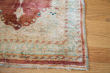 Fine weave and worn silk pile on the corner of a circa 1870s Persian Tabriz mat.
