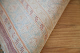 Reverse side of an antique silk Tabriz rug showing its exceptionally fine, high-density weave.