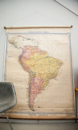 Bottom section of vintage Denoyer Geppert South America map showing 'SOUTH AMERICA' text and dowel.