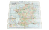 Antique early 20th century map of France in pastel colors, showing folds and slight wear.