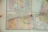 Patina and subtle pastel tones on the vintage map section of Algeria and Tunisia.