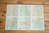 Vintage Switzerland map unfolded showing six city panels including Basel, Bern, and Zurich.