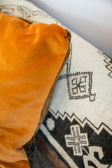Soft orange velvet texture of the Antique Orange Caucasian Pillow.