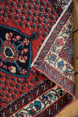 A vintage Engelas rug corner shows the rich wool pile and hand-knotted foundation.