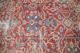 Sultanabad fragment's intricate allover floral and geometric motifs in light grapefruit red, blue, ivory, green.