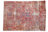 Sultanabad fragment rug in brilliant grapefruit red, airy ivory, blue, and green allover design, 72x108.
