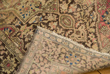 The hand-knotted foundation and secured fringe of an antique Farahan Sarouk rug.