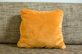 Vintage 1960s orange velvet backing on the handmade fragment pillow.