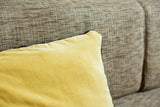 Mustard yellow backing with patterned edge of the vintage Mahal pillow.