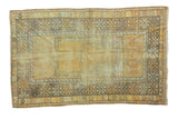 Distressed vintage Turkish prayer rug with Ladik style mihrab and a shimmering gold field.