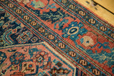 Early 20th-century Bijar rug's terracotta and blue Herati design with Morris style floral border.