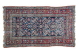 Distressed antique Northwest Persian rug; dark blue herati field, red border; late 19th century, 3'4