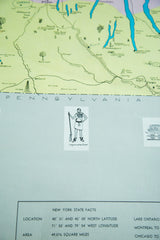 Vintage New York State pull down map showing Iroquois Chief vignette and state facts.