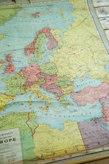 Antique Rand McNally pull-down map detail: Europe title, North Africa, and Mediterranean Sea.
