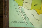 Antique folk art map of Pacific Ocean, Gulf of California, and wooden frame.